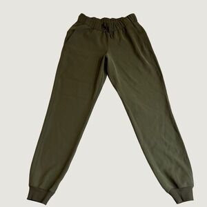 Lululemon On the Fly Joggers Dark Olive Green Woven Tapered Pants Womens Size 4